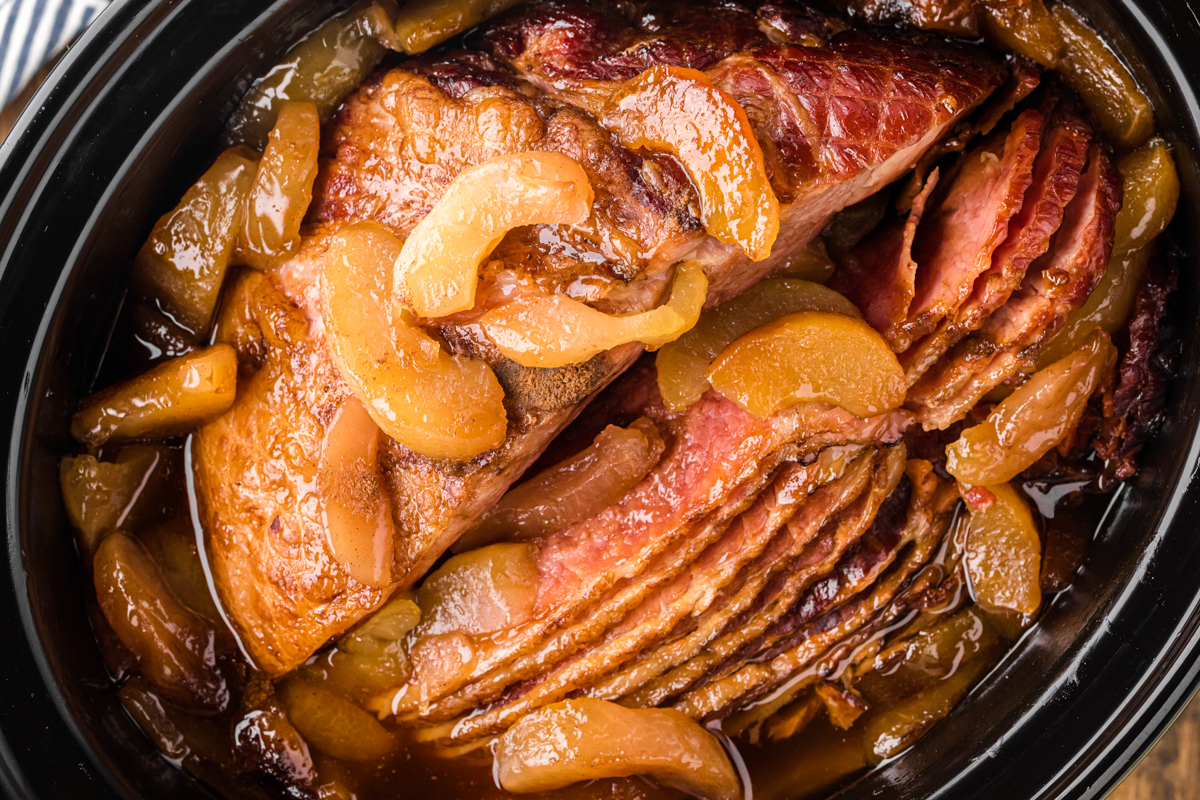 overhead shot of slow cooker apple and clove ham.