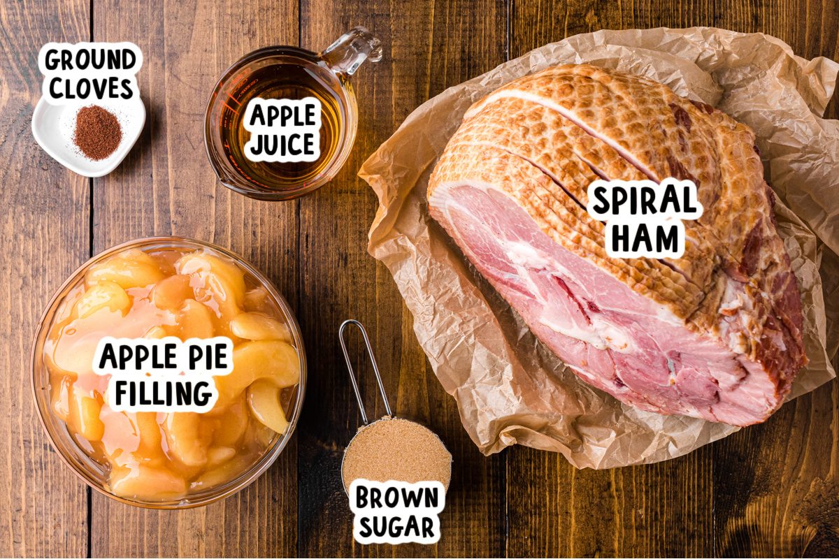 ingredients for slow cooker apple and clove ham on a table.