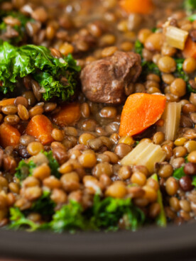close-up of slow cooker beef and lentil soup.