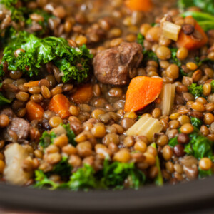 close-up of slow cooker beef and lentil soup.