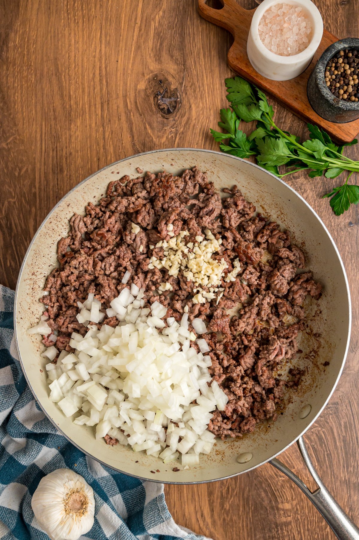 ground beef, onion and garlic in a pan.