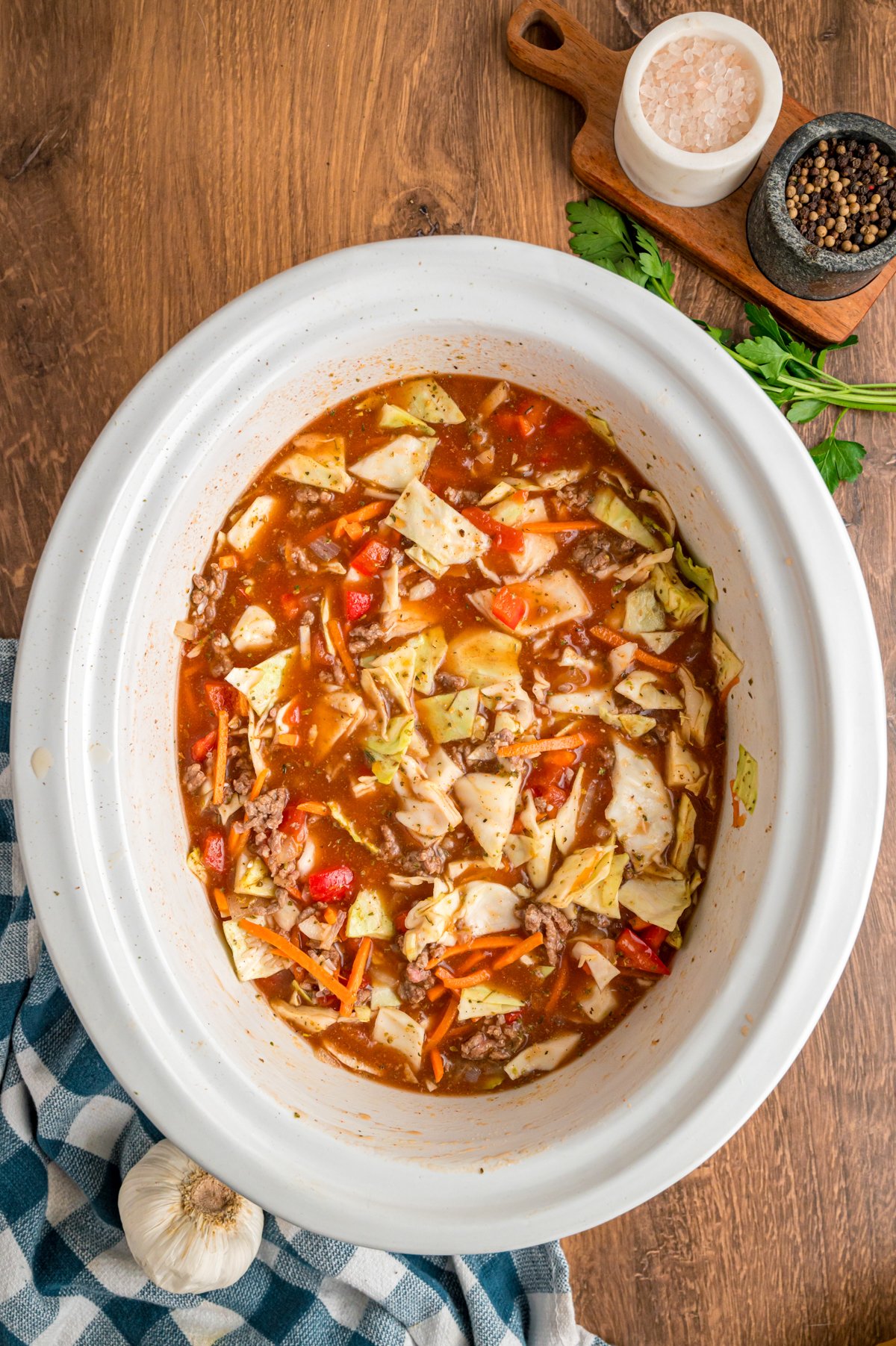 uncooked cabbage soup in a slow cooker.