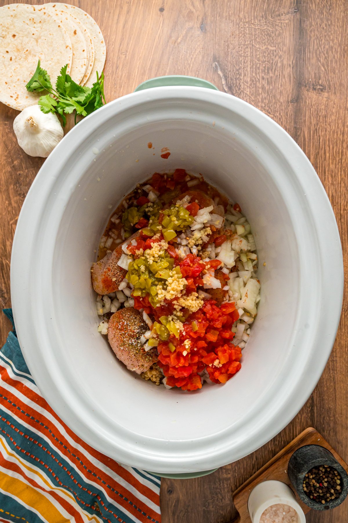 chicken with vegeatbles on top.