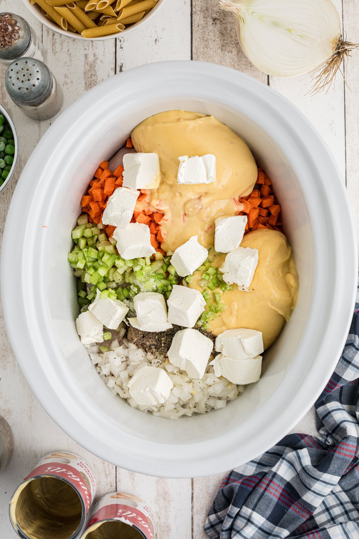 chicken, vegetables, cream of chicken soup in the slow cooker.