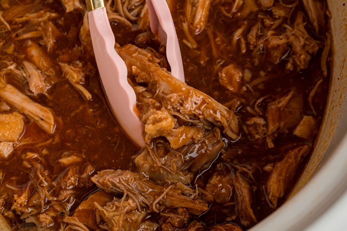 overhead close-up of slow cooker dr. pepper pulled pork .