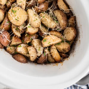 overhead shot of slow cooker garlic parmesan potatoes.