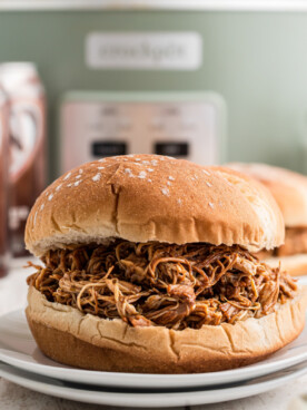 slow cooker root beer chicken on a bun.