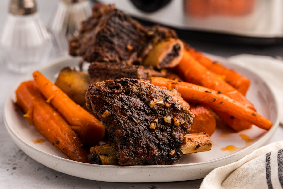 close-up of slow cooker short ribs on a plate.