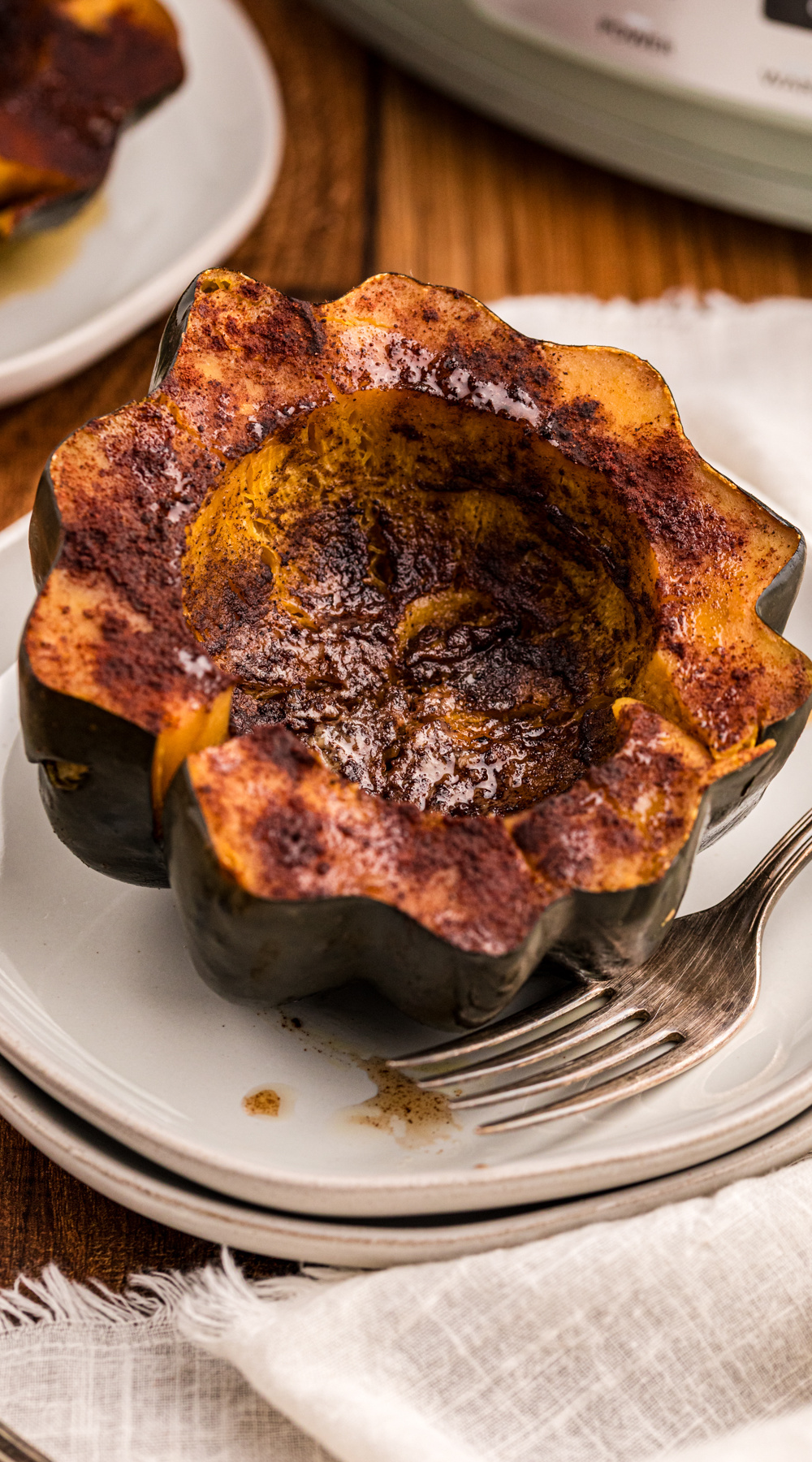 long image of slow cooker acorn squash.