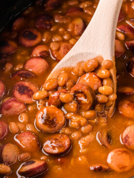 close-up of slow cooker beanies and weenies in a crockpot.