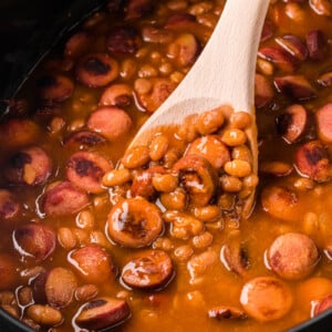close-up of slow cooker beanies and weenies in a crockpot.