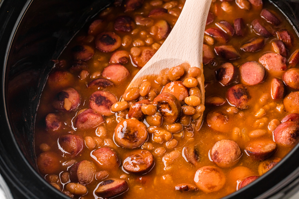 close-up of slow cooker beanies and weenies in a crockpot.
