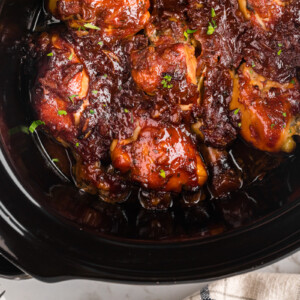 close-up overhead of slow cooker chicken in a hurry.