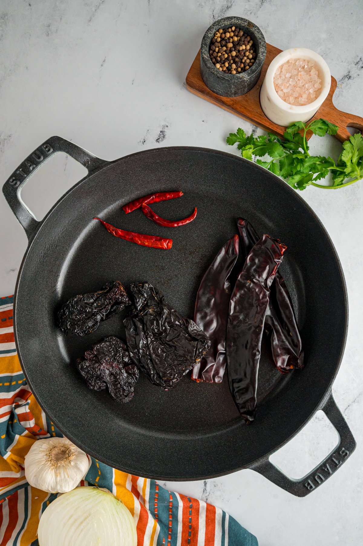 chilies heating in a skillet.