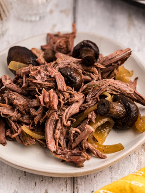 close-up of serving of slow cooker horseradish pot roast on a plate.