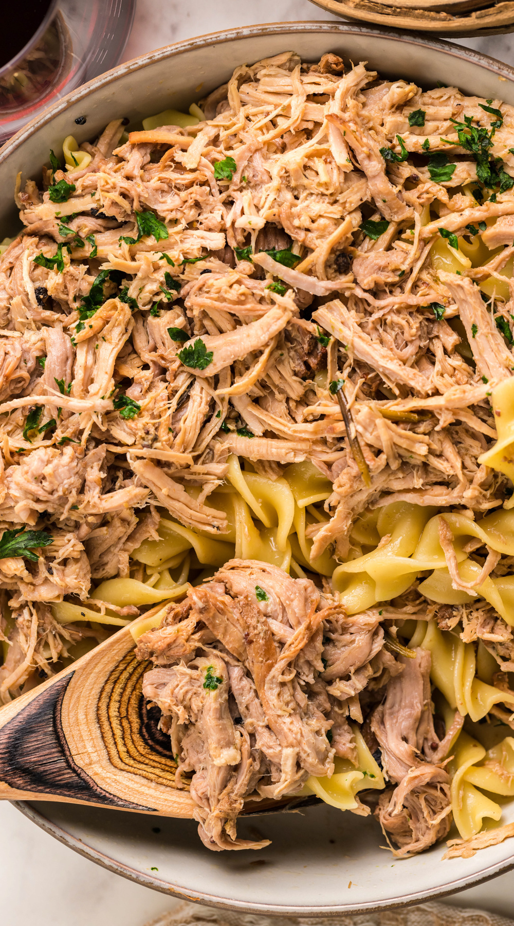 long image of slow cooker pulled pork pasta.