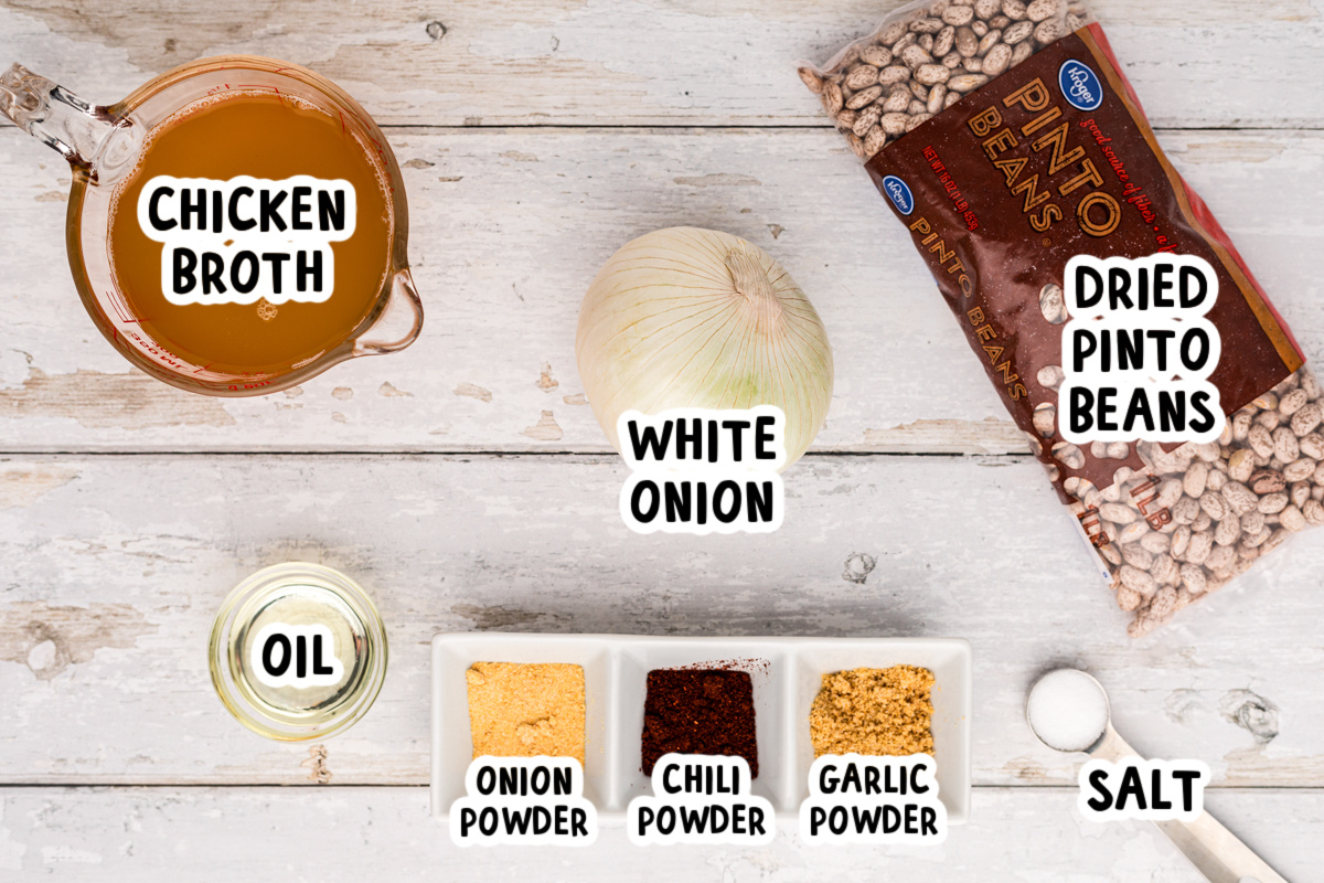 ingredients for slow cooker refried bean soup on a table.