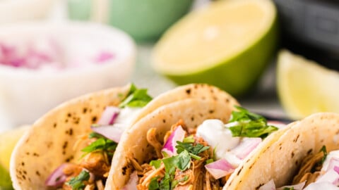 Slow cooker beergarita tacos on a plate.
