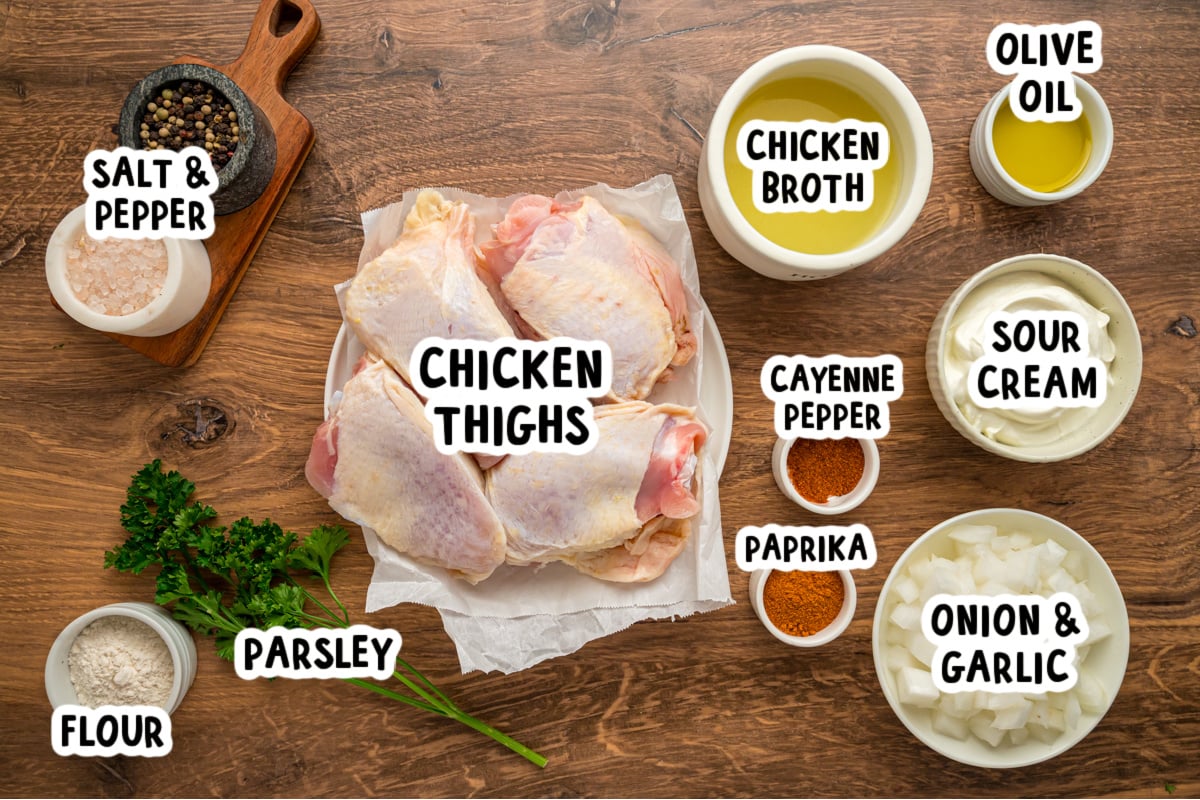 Ingredients for slow cooker chicken paprika on a table.