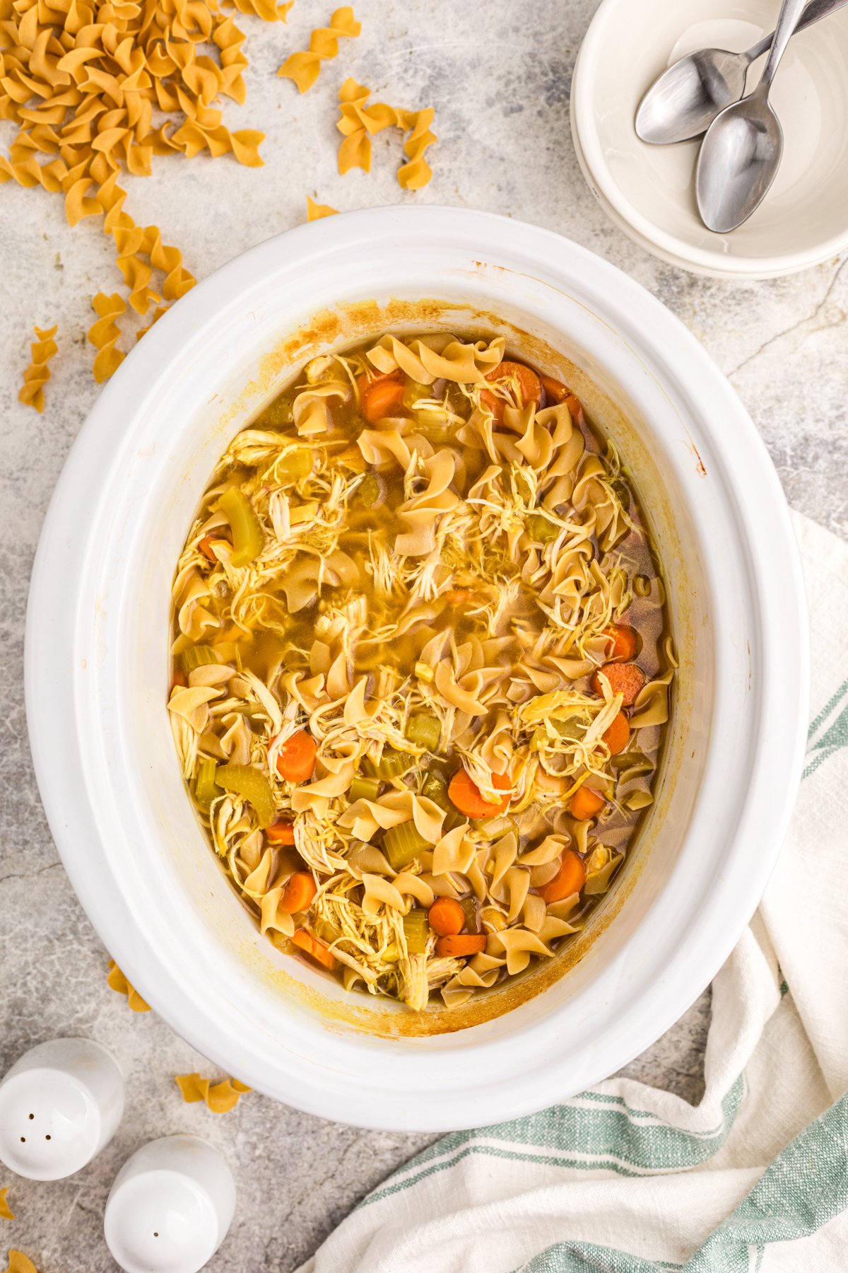 Slow cooker curried chicken noodle soup after cooking.