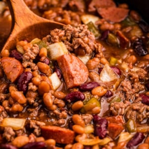 close=up of slow cooker loaded baked beans.