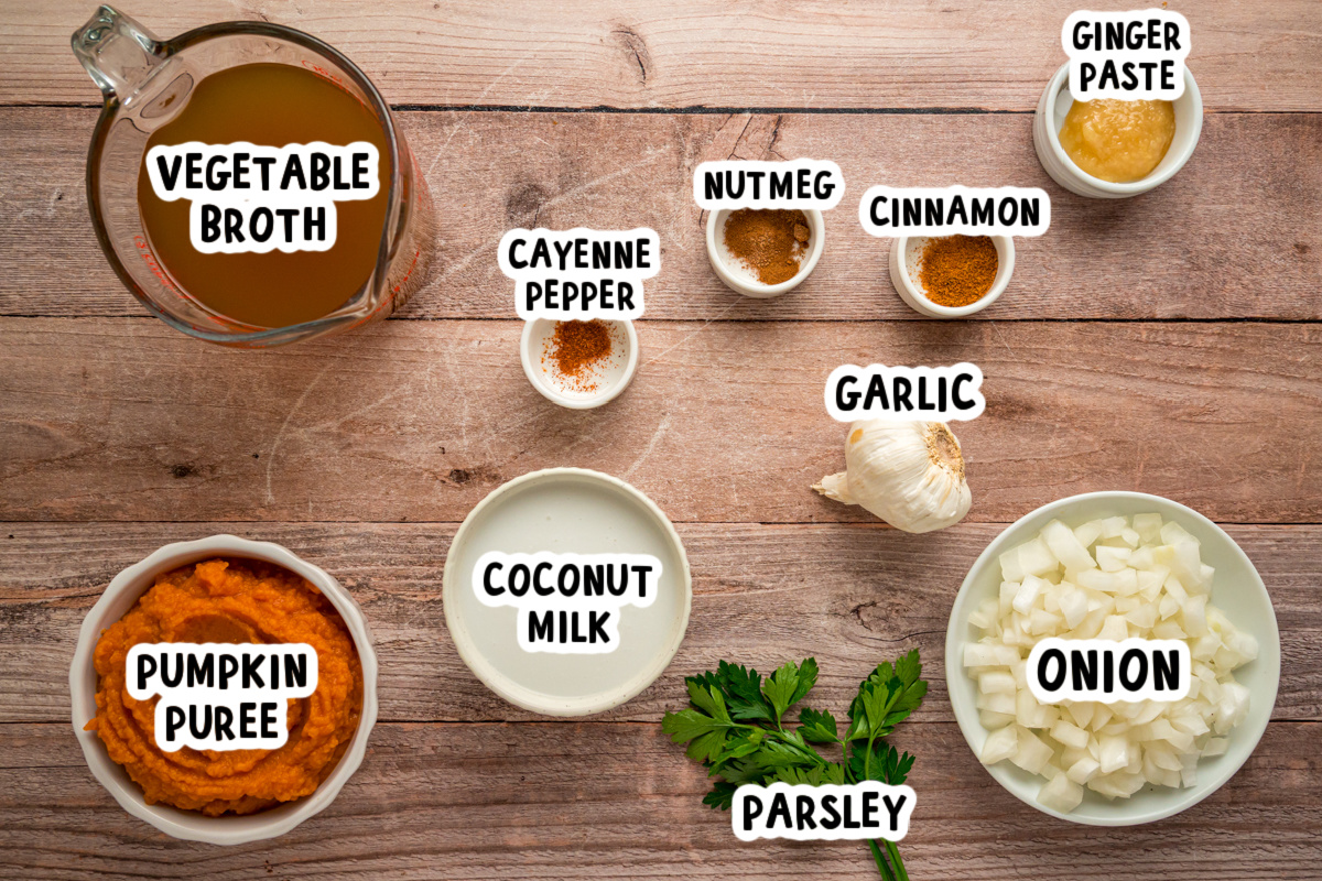 ingredients for slow cooker pumpkin soup on a table.