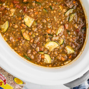 Slow cooker sausage lentil soup in a crockpot.
