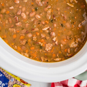 Slow cooker pinto bean soup in a crockpot.