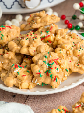 Close-up of slow cooker avalanche cookies stacked on a plate.