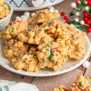 Close-up of slow cooker avalanche cookies stacked on a plate.