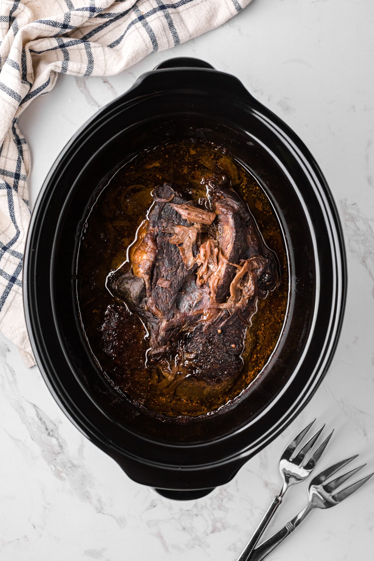 Georgia pot roast in a crockpot after cooking.