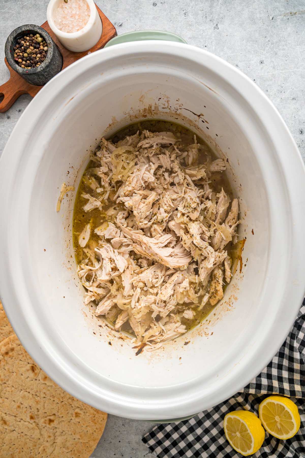 Shredded chicken in a crockpot.