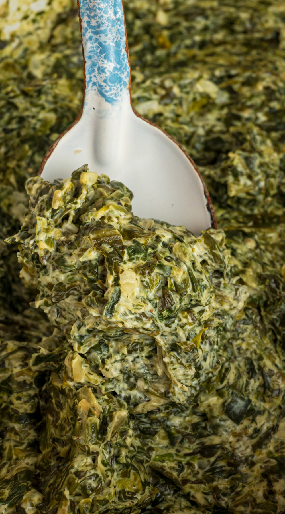 Long image of slow cooker creamed spinach.