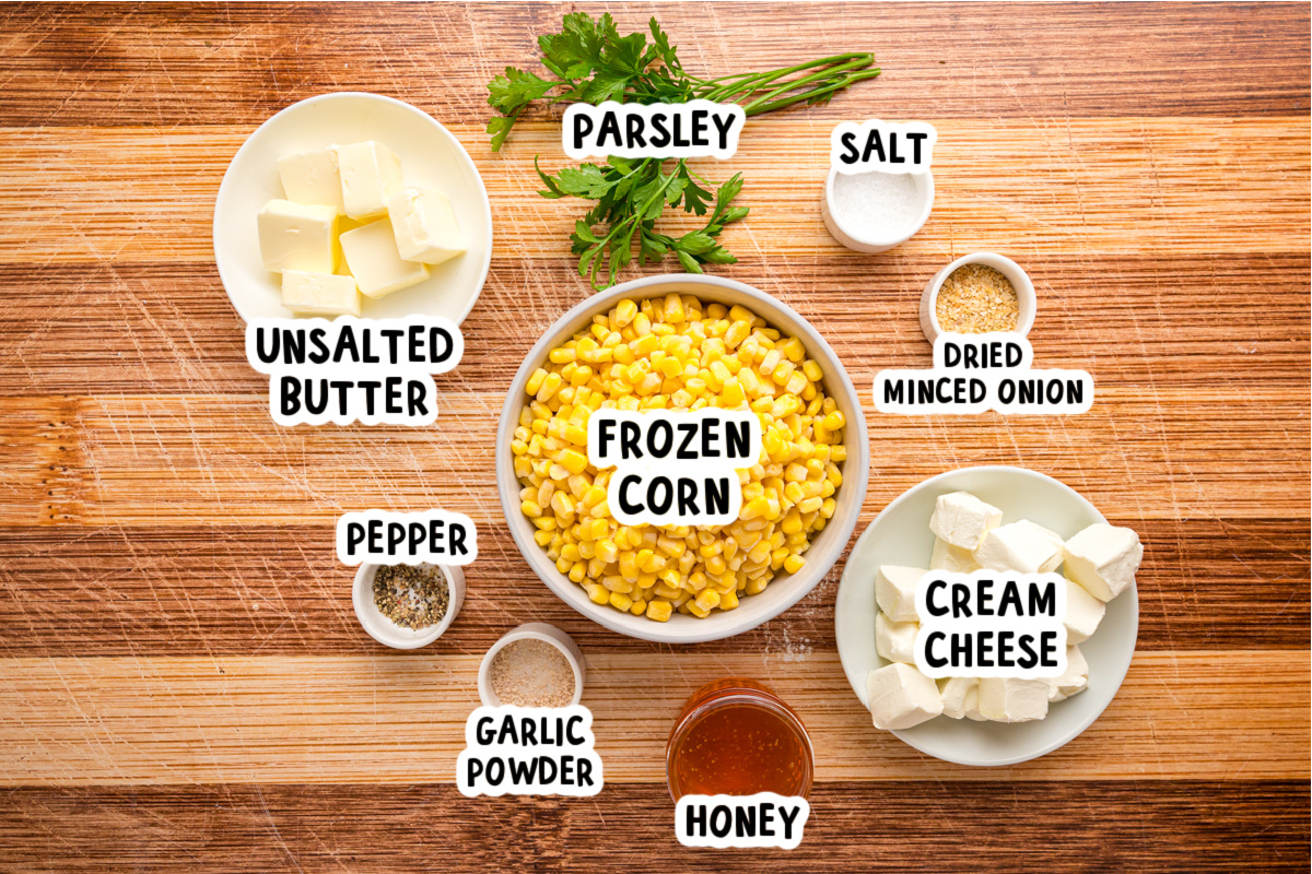 Ingredients for slow cooker honey butter corn on a table.