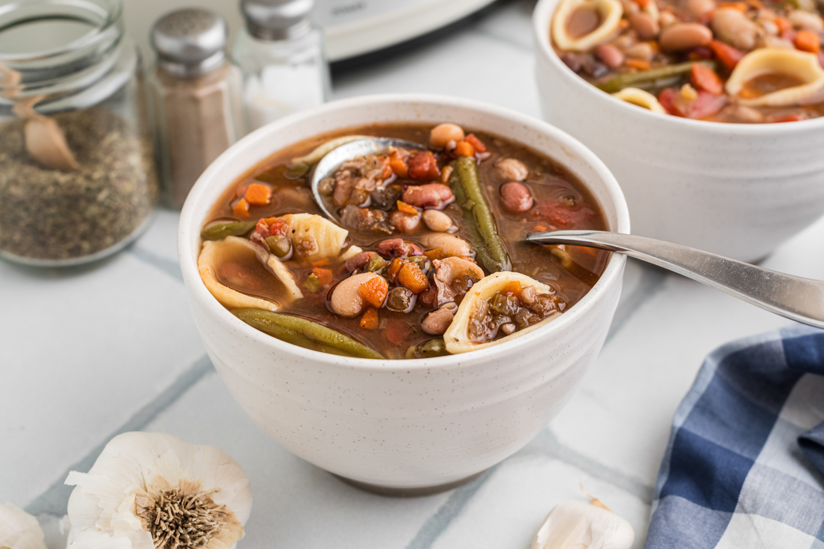 Slow cooker 15 bean minestrone soup in two bowls.