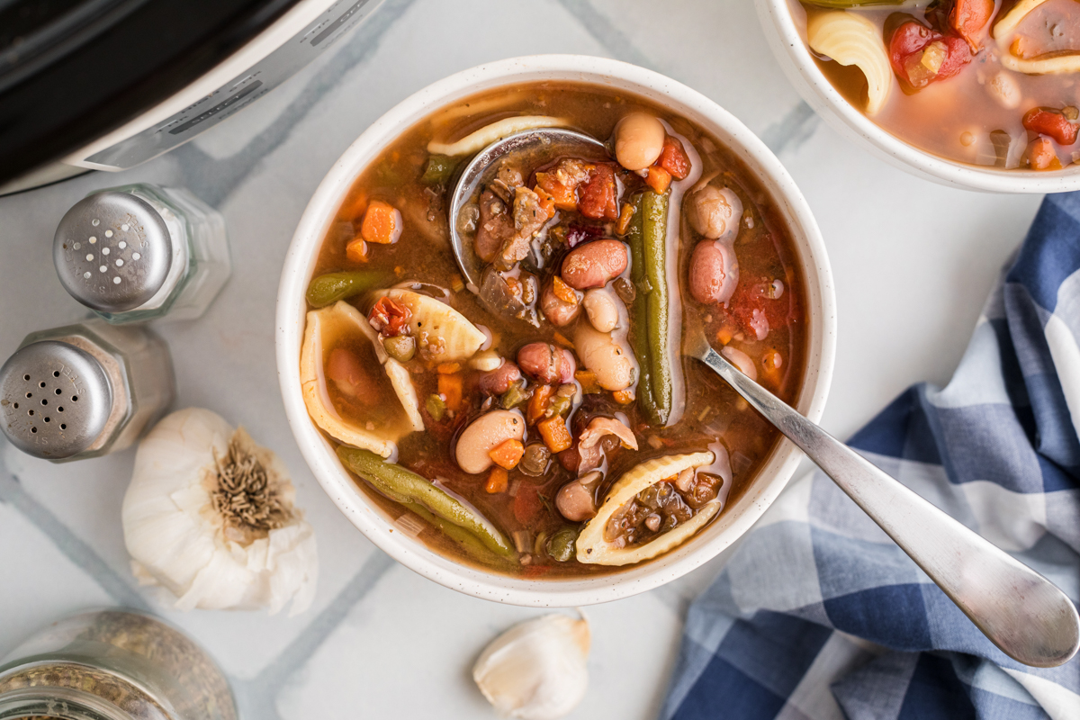 A bowl of slow cooker 15 bean minestrone soup.
