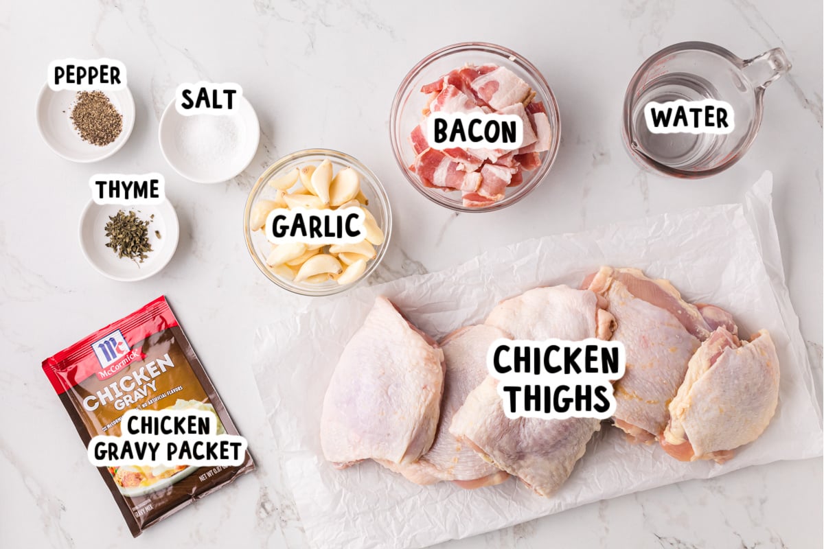 Ingredients for slow cooker 40 clove chicken on a table.