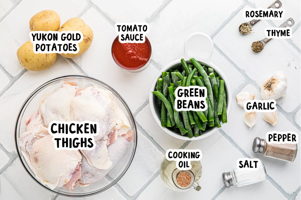 Ingredients for slow cooker full chicken dinner on a table.