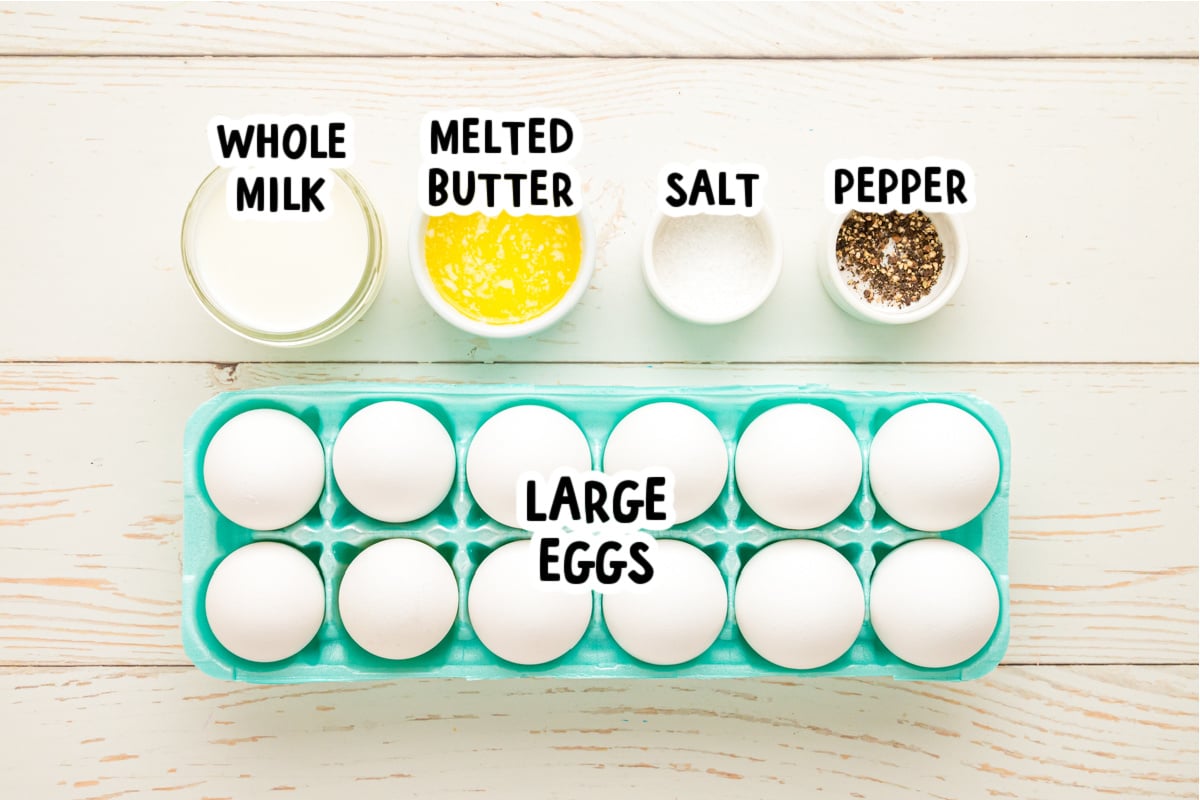 Ingredients for scrambled eggs on a table.