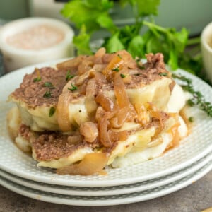 Sliced slow cooker french onion meatloaf on a plate.