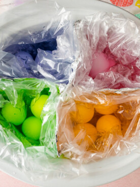 colored easter eggs divided in a slow cooker.