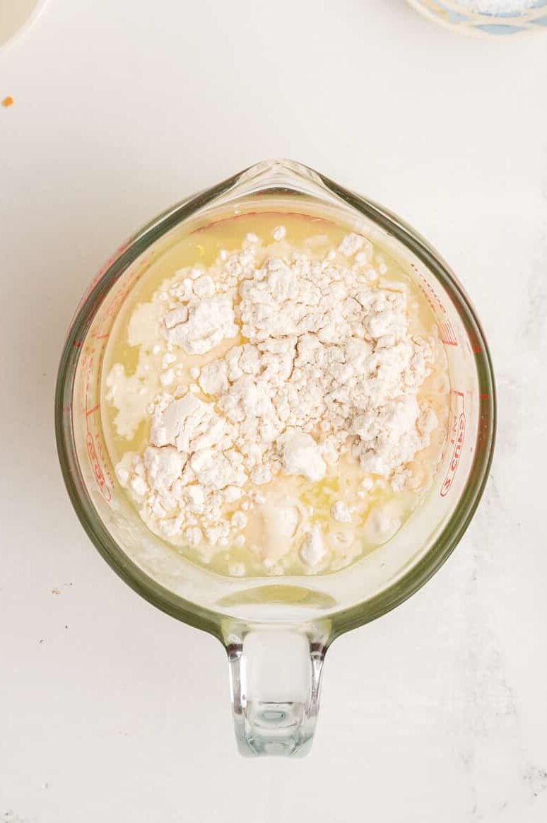 Flour and cornstarch being mixed togeher.