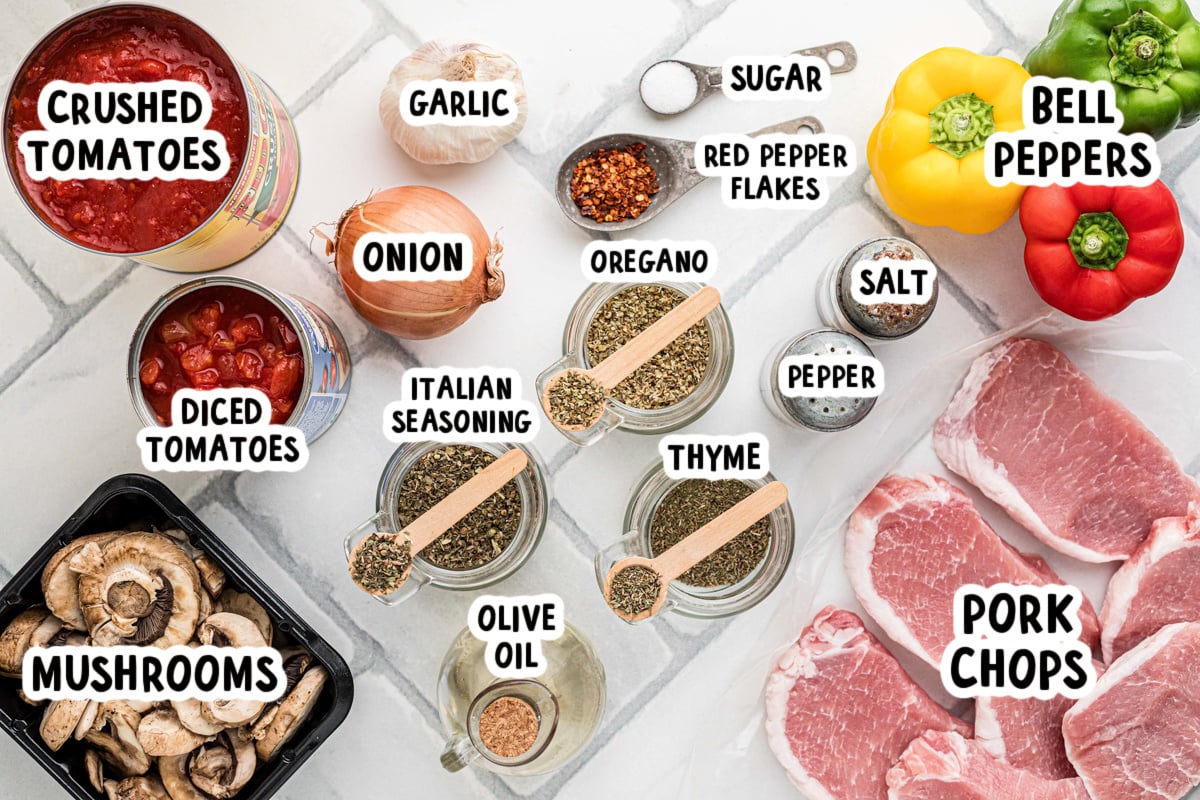 Ingredients for slow cooker pork chop cacciatore on a table.