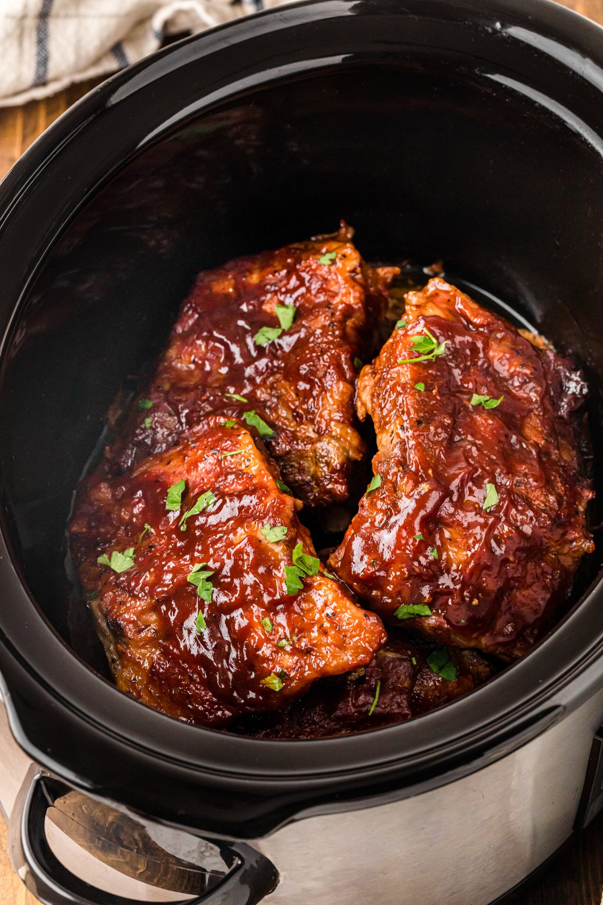 Slow cooker baby back ribs in a crockpot.