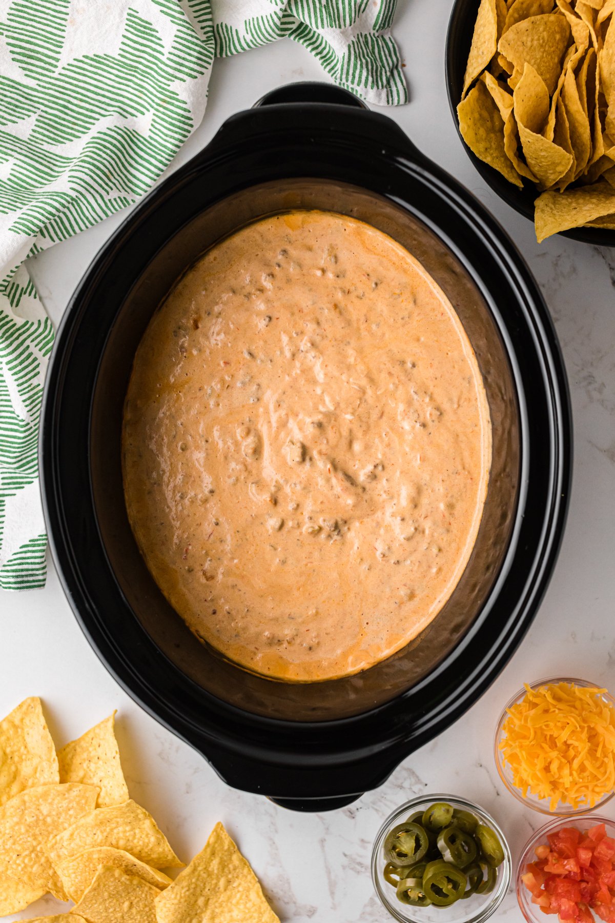Taco dip in a crockpot after cooking.