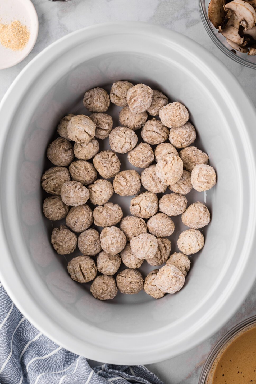 FROZEN meatballs in a slow cooker.