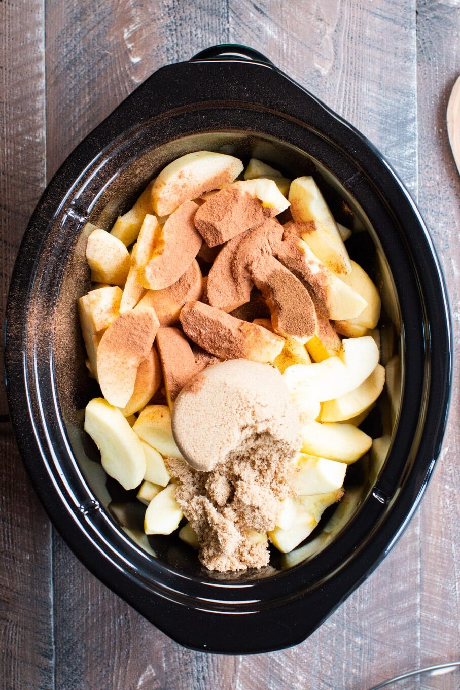 apples with spices and brown sugar on top