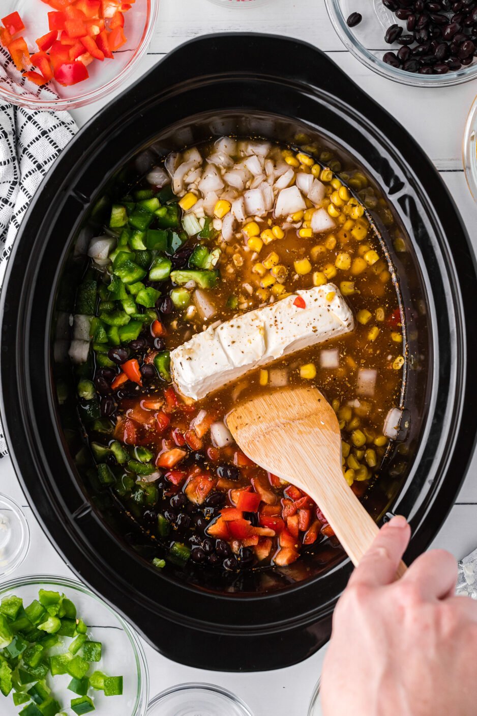 ingredients for chicken fajita soup in a slow cooker.