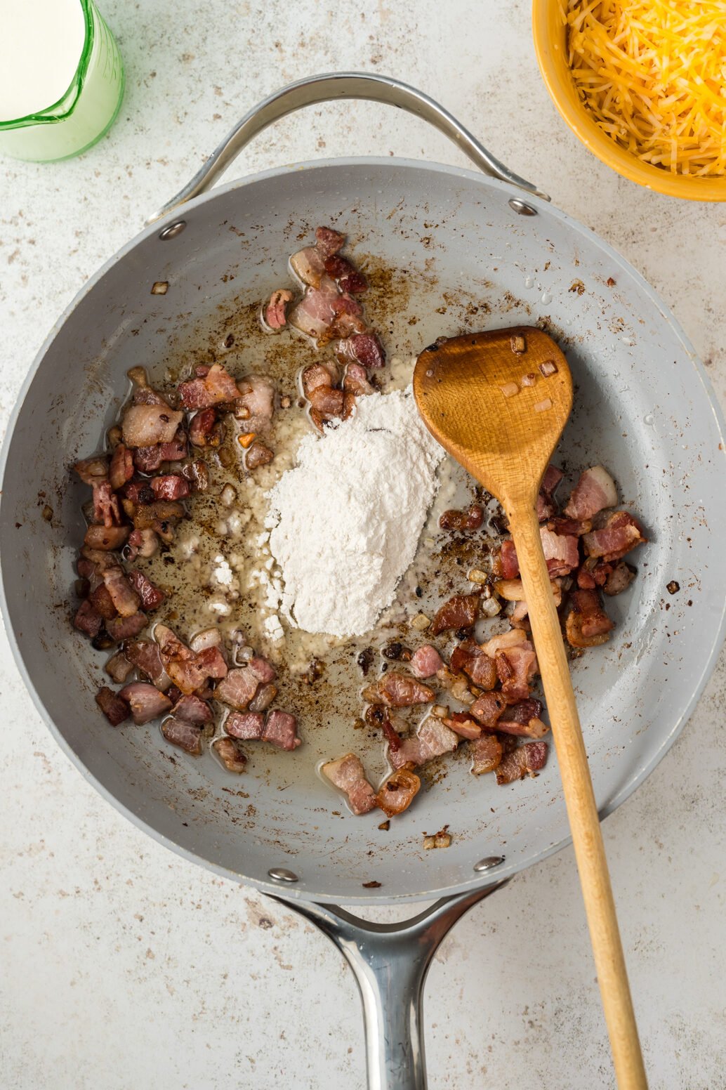 bacon sautéed in a pan with flour added.