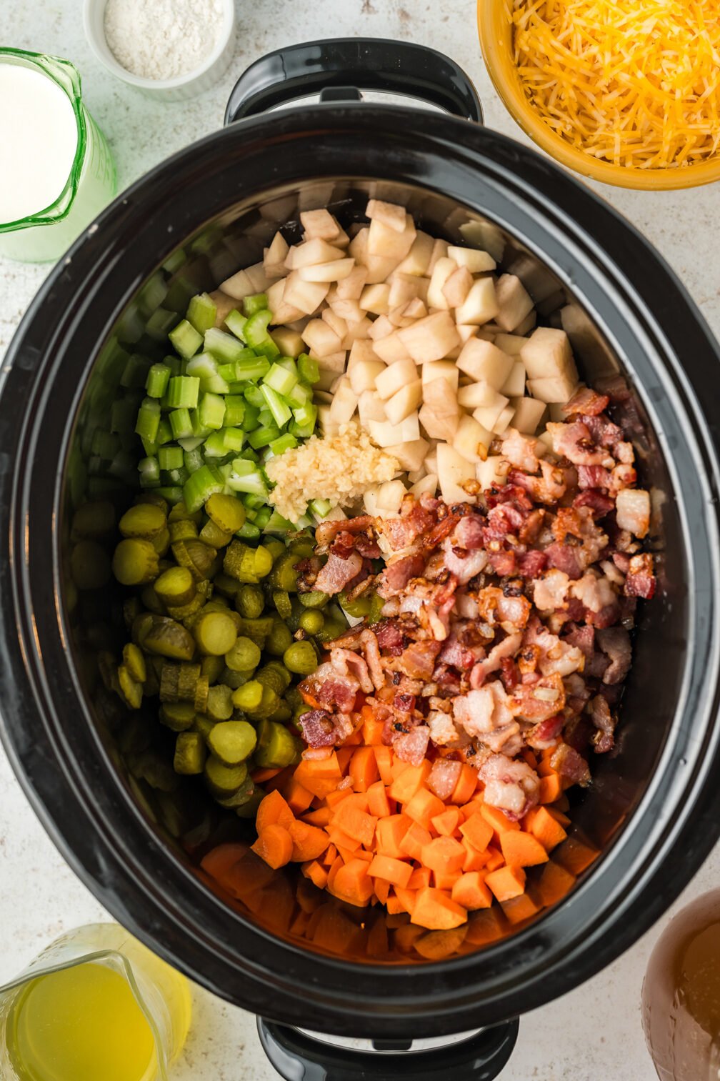vegetables, pickles in a slow cooker for dill pickle soup.